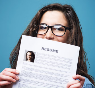 Someone holding their résumé.