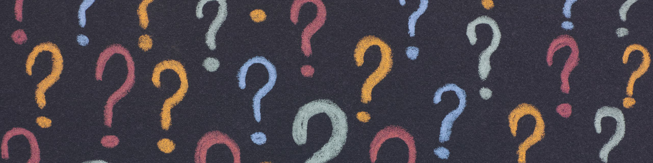 Header. Question marks on a chalkboard.